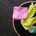 Rubber gloves, cloth and cleaner to help with spring cleaning a house